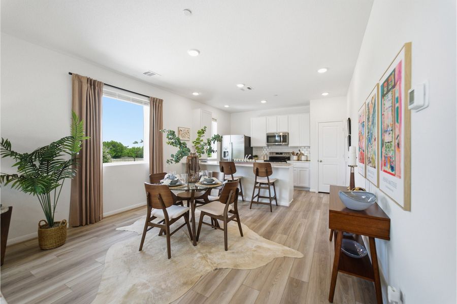 Representative furnished interior of a home built from the Kahn by CastleRock Communities in Municipal Drive Townhomes, Leander (Image 8).