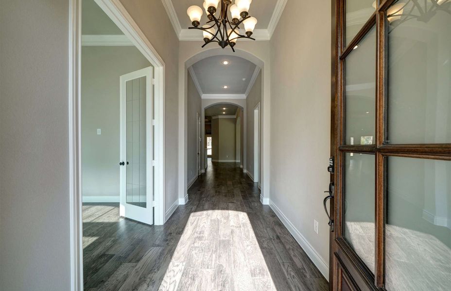 Representative unfurnished interior of a home built from the 3030 by Ravenna Homes in The Woodlands Hills 65′, Willis (Image 15). Representative unfurnished interior of a home built from the 3030 by Ravenna Homes in The Woodlands Hills 65′, Willis (Image 15).