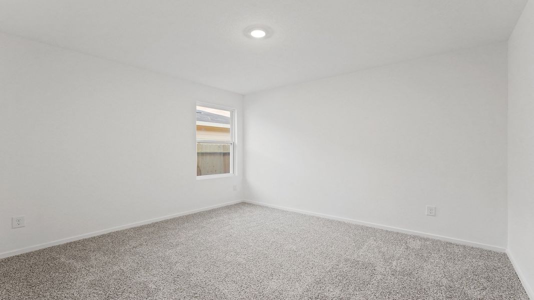 Representative unfurnished interior of a home built from the Lakeway by D.R. Horton in New Waverly Station, New Waverly (Image 18).