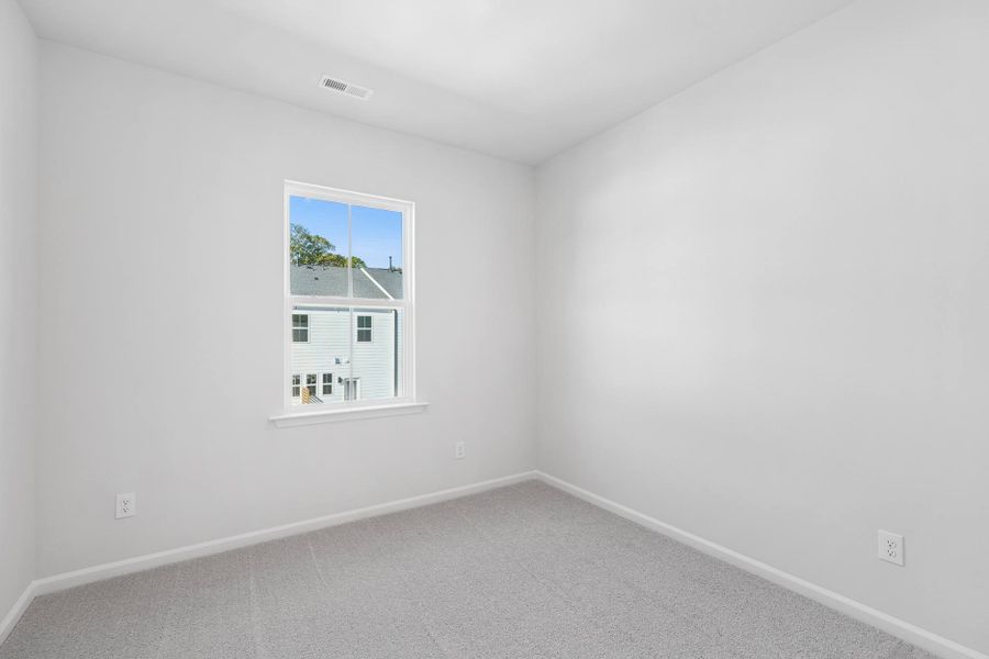 Representative unfurnished interior of a home built from the Nola by Tri Pointe Homes in Twinleaf Townes, Chapel Hill (Image 14).
