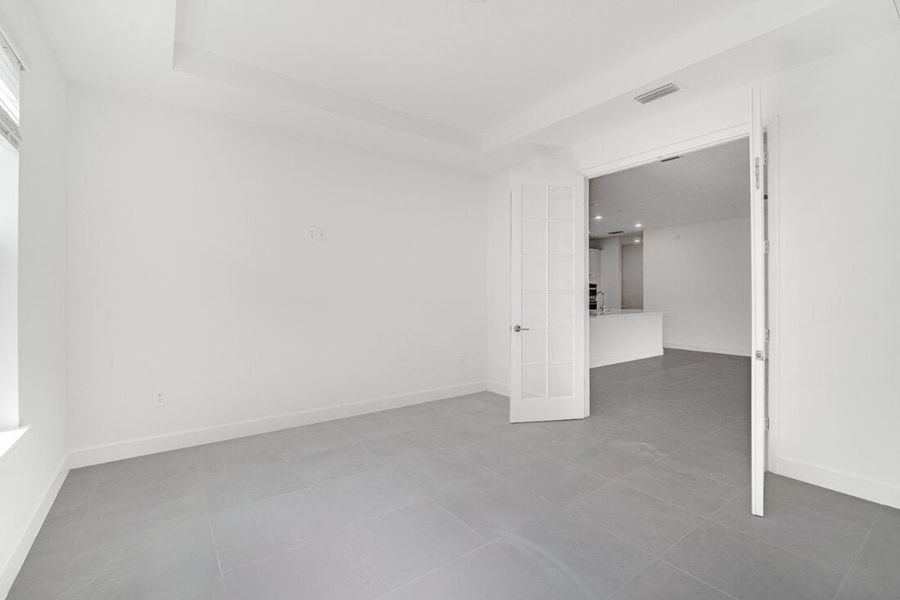 Spacious, unfurnished interior of a new home in Harvest at Ovation, Winter Garden (Image 22).