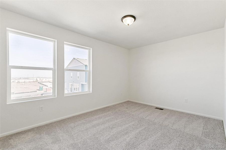 Spacious, unfurnished interior of a new home in Turnberry Villas, Commerce City (Image 32).