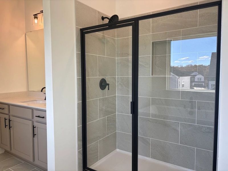 Primary Bath featuring the AW Collection® Foundry - Sleek finishes and dramatic contrasts shine.