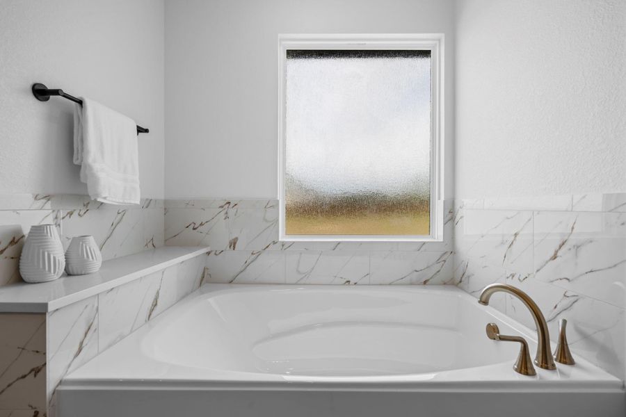 Bathroom featuring a garden tub