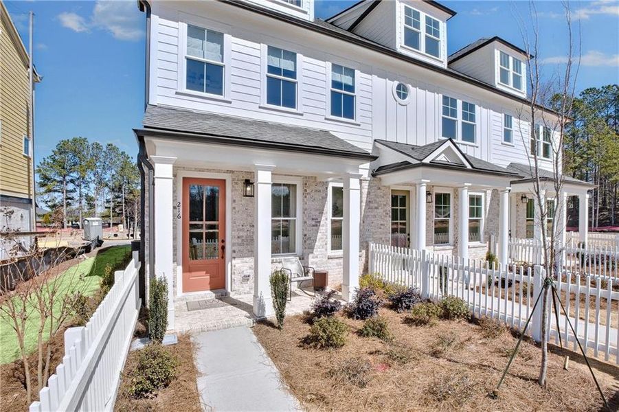 Front exterior of a new home in The Village at River Green, Canton, GA, highlighting curb appeal (Image 15).