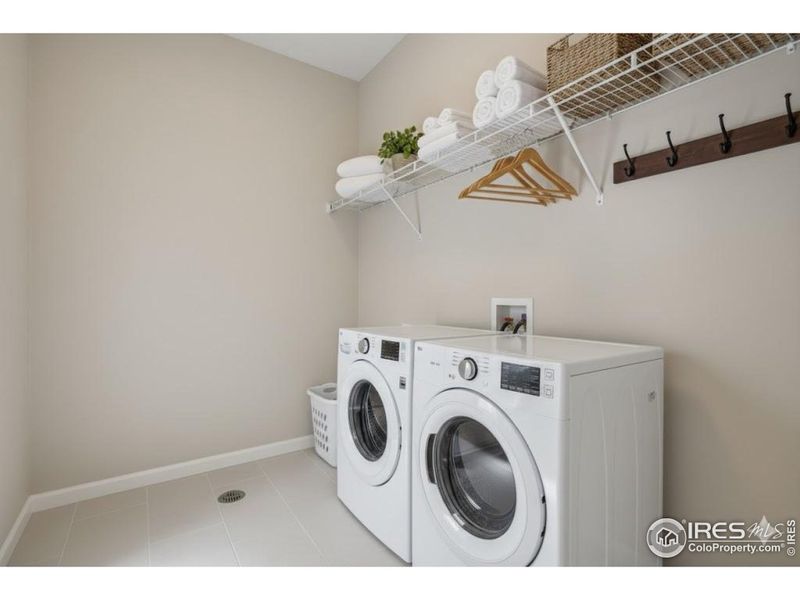 Dedicated laundry room on the top level