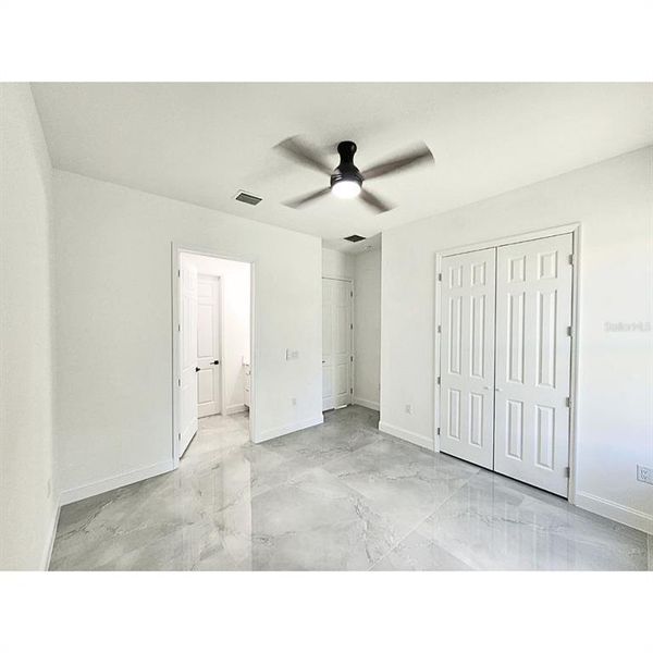 Spacious, unfurnished interior of a new home in , Port Charlotte (Image 14).