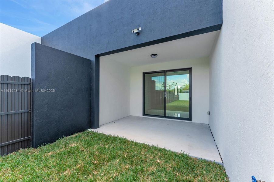 Exterior details and patio area of a home in , Miami (Image 3).