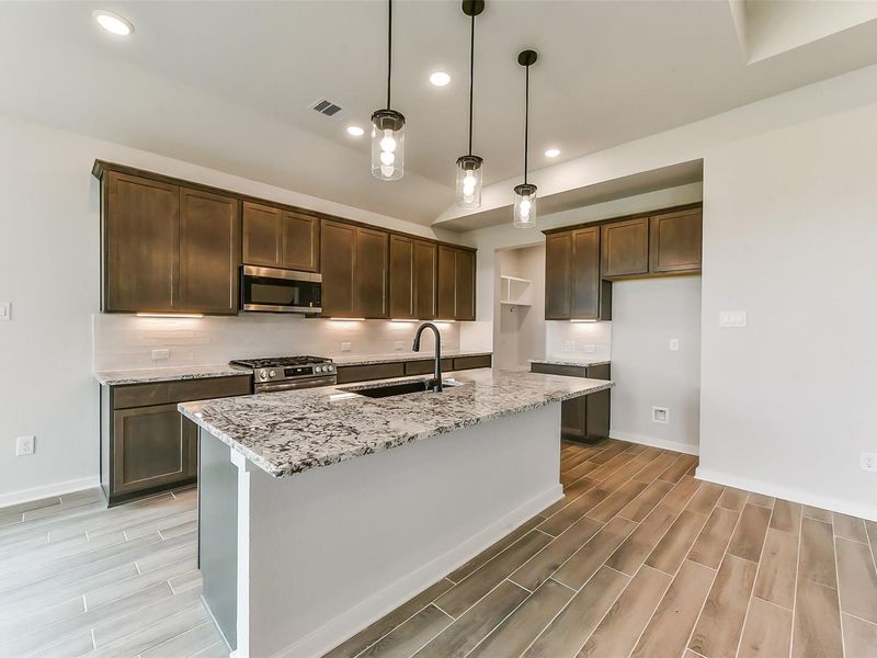 Furnished interior view inside a new home in Sundance Cove, Crosby (Image 14).