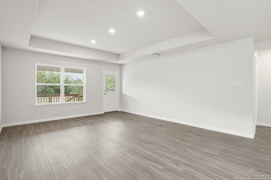 Spacious, unfurnished interior of a new home in Hunters Ranch, San Antonio (Image 18).