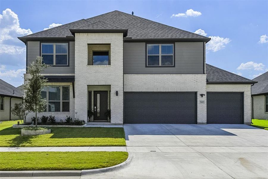 Front exterior of a new home in Dove Hollow, Waxahachie, TX, highlighting curb appeal (Image 1).