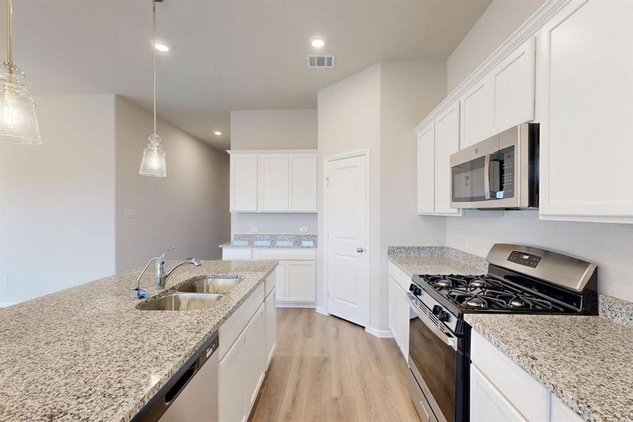Furnished interior view inside a new home in Mobberly Farms, Pilot Point (Image 8). Furnished interior view inside a new home in Mobberly Farms, Pilot Point (Image 8).