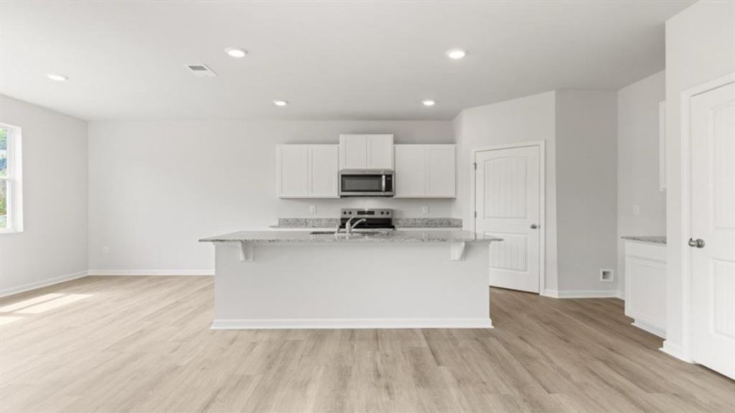 Furnished interior view inside a new home in Oaks at Cedar Grove, Fairburn (Image 10).