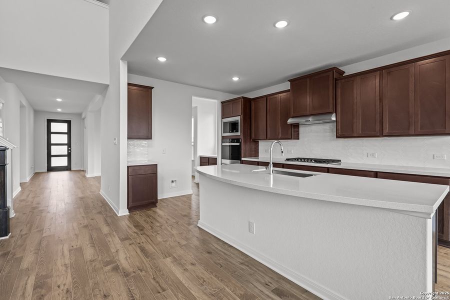 Furnished interior view inside a new home in Homestead 75', Schertz (Image 11).