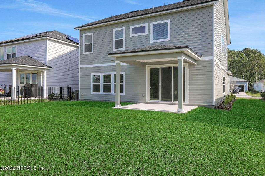 Exterior details and patio area of a home in Hyland Trail, Green Cove Springs (Image 30).
