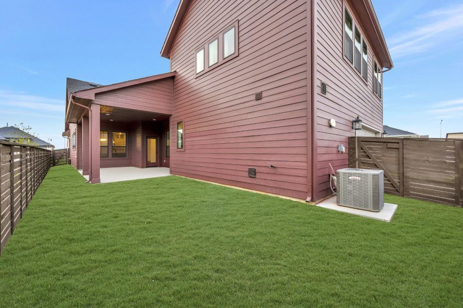 Exterior details and patio area of a home in Indigo - Enclave Collection, Richmond (Image 3).