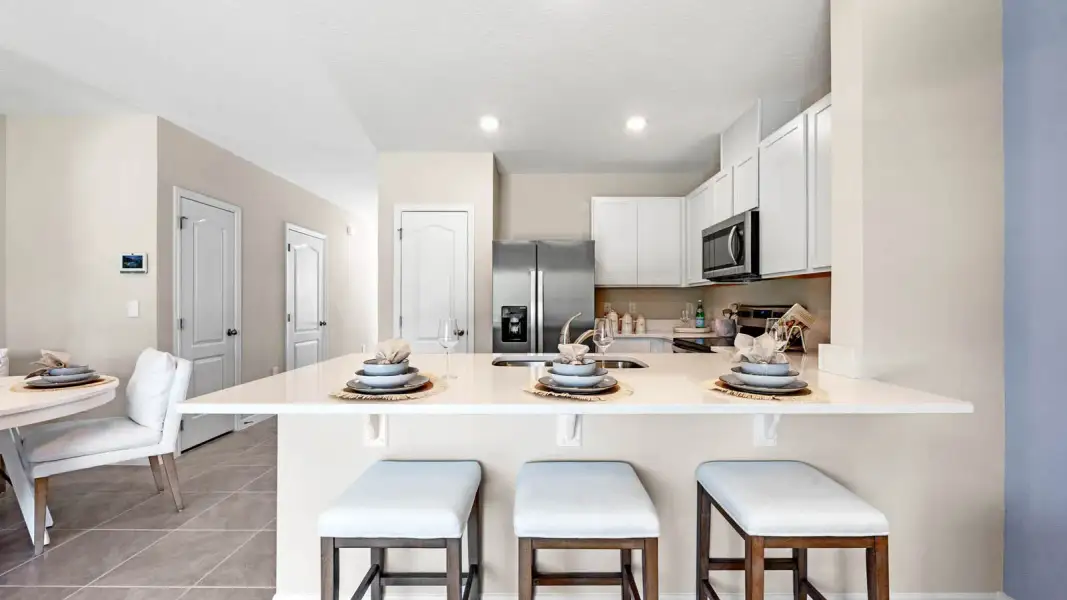 Representative furnished interior of a home built from the Pearson by D.R. Horton in Hawthorne Ranch Townhomes, Lakeland (Image 15).