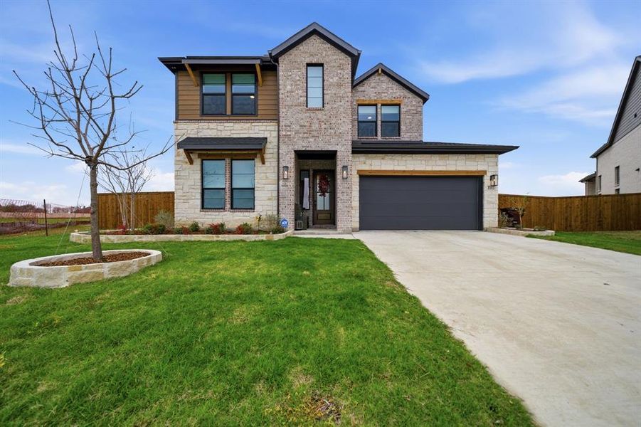 Front exterior of a new home in , Royse City, TX, highlighting curb appeal (Image 2). Front exterior of a new home in , Royse City, TX, highlighting curb appeal (Image 2).