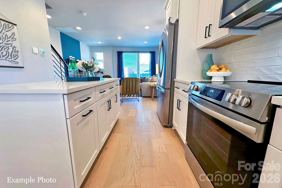 Furnished interior view inside a new home in North End Terraces, Charlotte (Image 3).