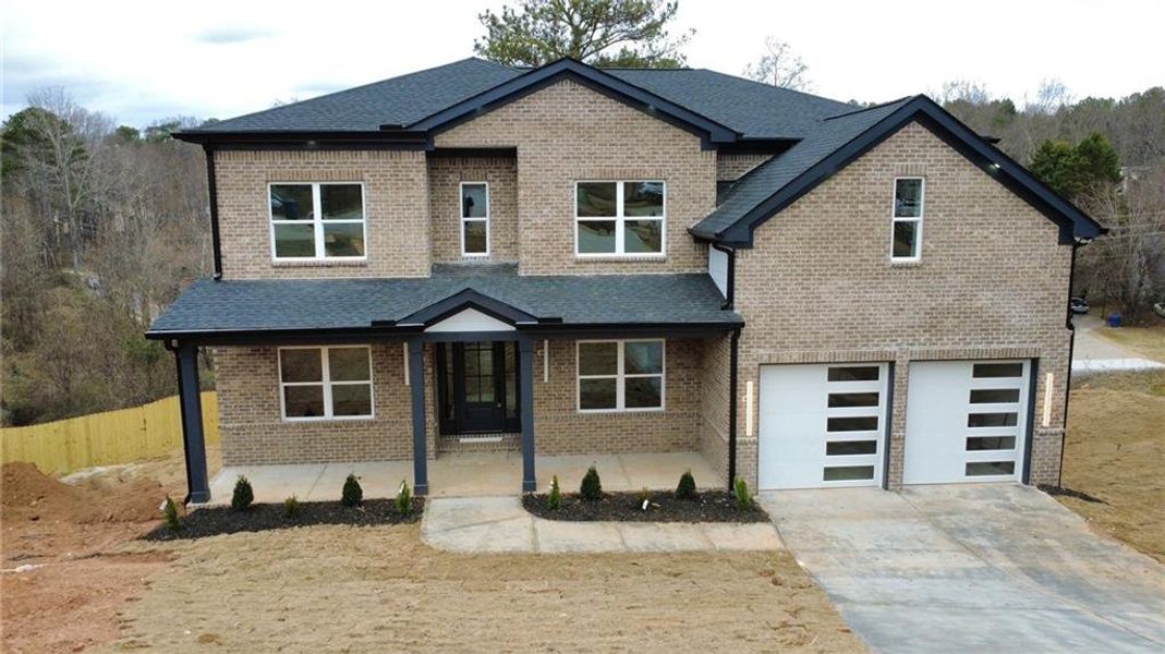 Front exterior of a new home in , Lawrenceville, GA, highlighting curb appeal (Image 28).