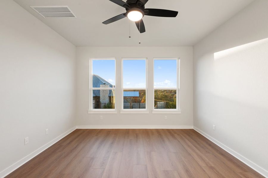 Spacious, unfurnished interior of a new home in Terrace Collection at Lariat, Liberty Hill (Image 38).