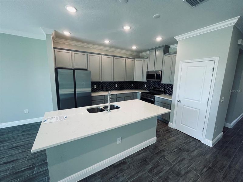 Furnished interior view inside a new home in Graceland Estates, Thonotosassa (Image 8). Furnished interior view inside a new home in Graceland Estates, Thonotosassa (Image 8).