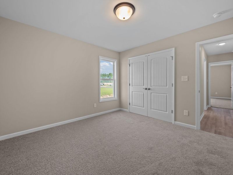 Representative unfurnished interior of a home built from the Mason A by JC Jackson Homes,LLC in Heritage Pointe, Newport (Image 10).