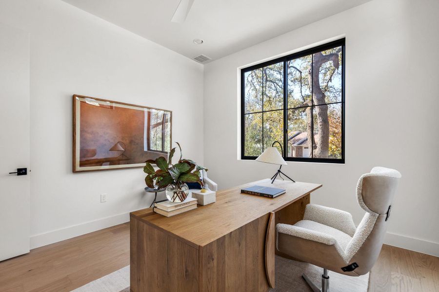 Office space featuring light wood finished floors