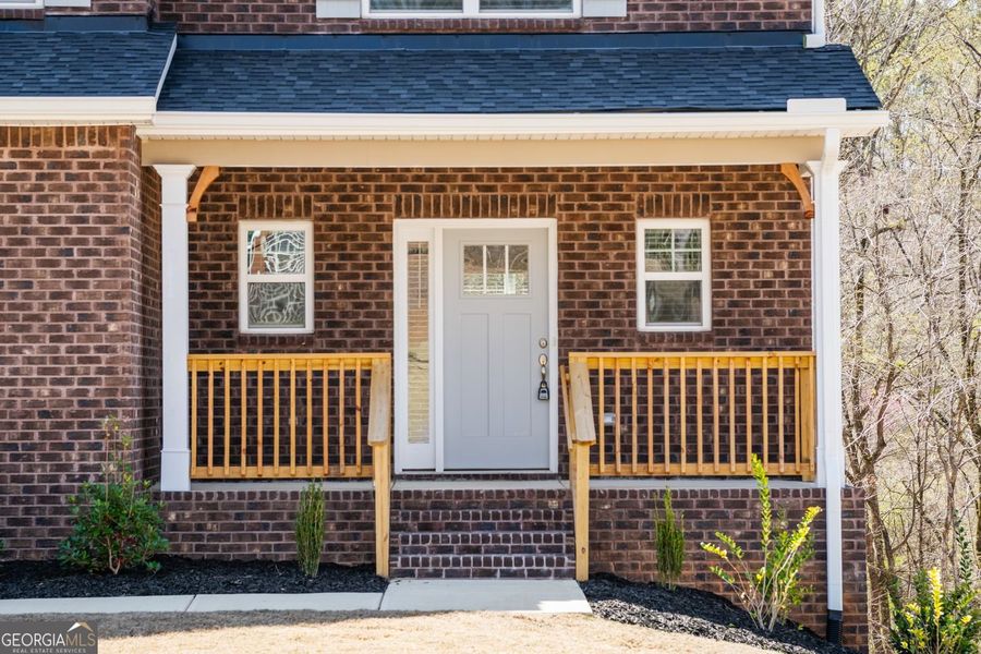 Front exterior of a new home in Carson's Walk, Macon, GA, highlighting curb appeal (Image 2).