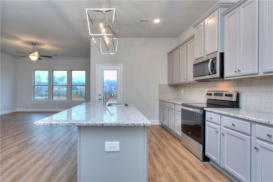 Furnished interior view inside a new home in , Homer (Image 5). Furnished interior view inside a new home in , Homer (Image 5).