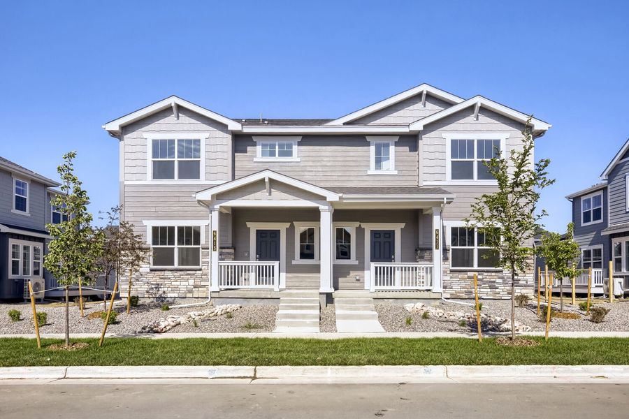Front exterior of a new home in Timber Lark, Fort Collins, CO, highlighting curb appeal (Image 1). Front exterior of a new home in Timber Lark, Fort Collins, CO, highlighting curb appeal (Image 1).