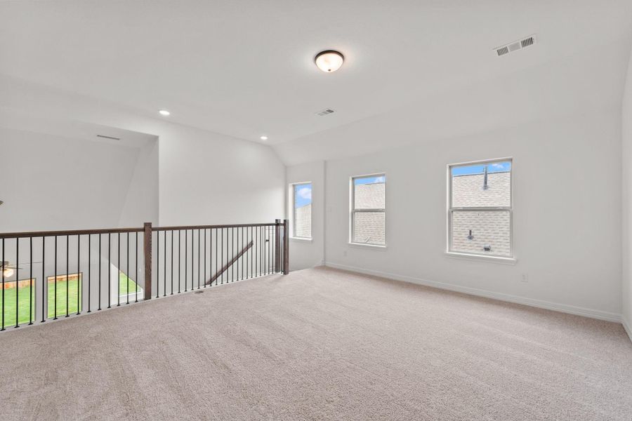 As you make your way upstairs this exceptional game room is a standout feature in this remarkable property, offering a space that combines luxury and fun for all ages.