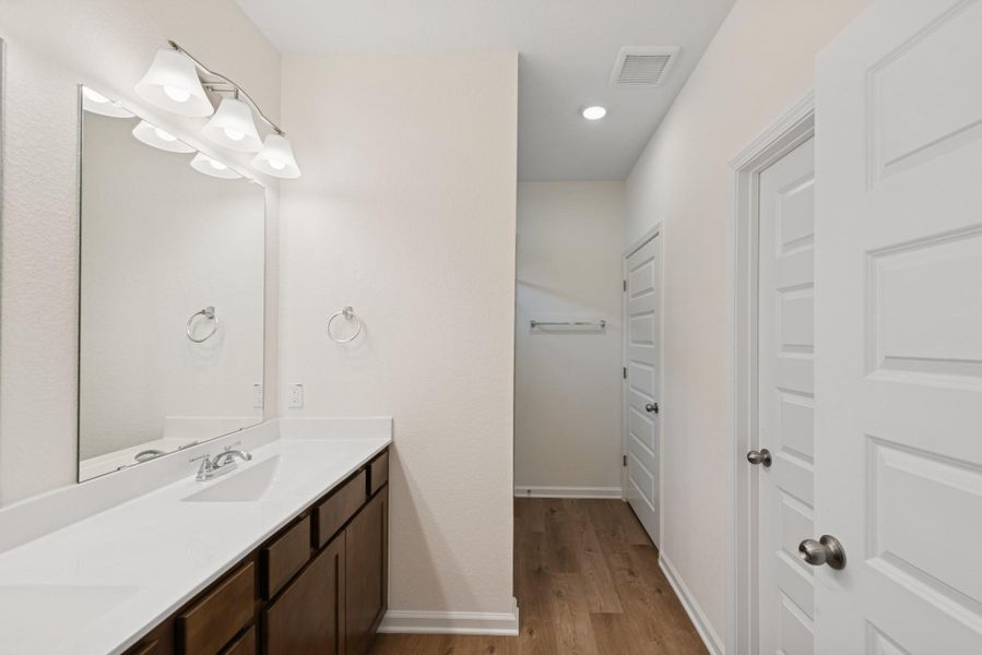 The Mockingbird II- Primary Bathroom with Dual Vanities The Mockingbird II- Primary Bathroom with Dual Vanities
