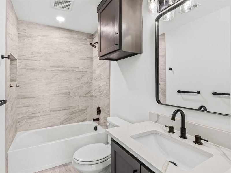 Full bath featuring bathtub / shower combination, vanity, recessed lighting, and light wood-style floors