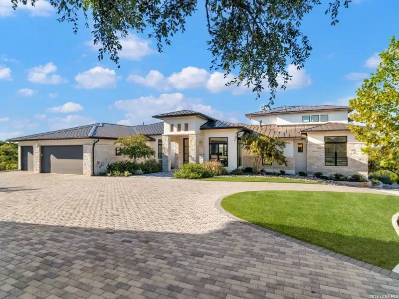 Front exterior of a new home in , San Antonio, TX, highlighting curb appeal (Image 24).