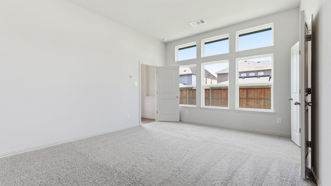 Furnished interior view inside a new home in Green Meadows Premier, Celina (Image 29).