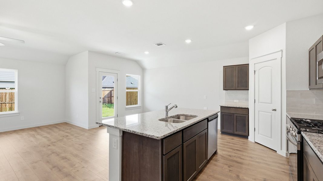 Furnished interior view inside a new home in Patriot Estates, Venus (Image 27).