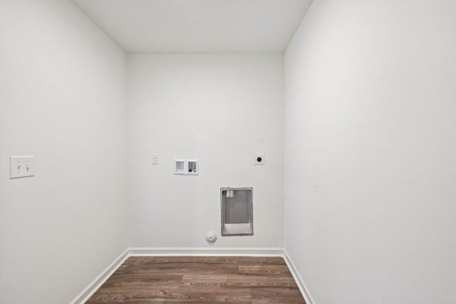 A room with a wood floor and a wood floor. A room with a wood floor and a wood floor.