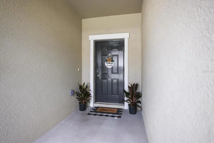 Exterior details and patio area of a home in , Palmetto (Image 28).