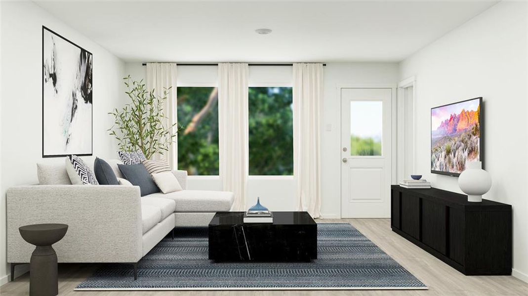 Living room with light hardwood / wood-style floors