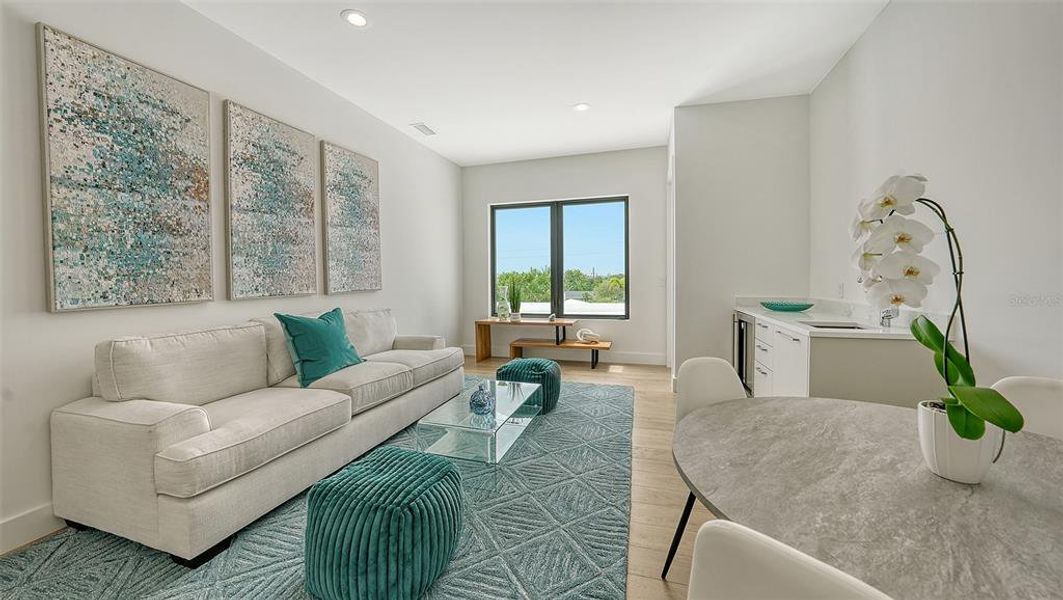 Second living room includes a wet bar.