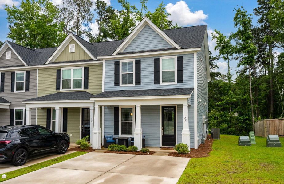 Front exterior of a new home in , Summerville, SC, highlighting curb appeal (Image 23).