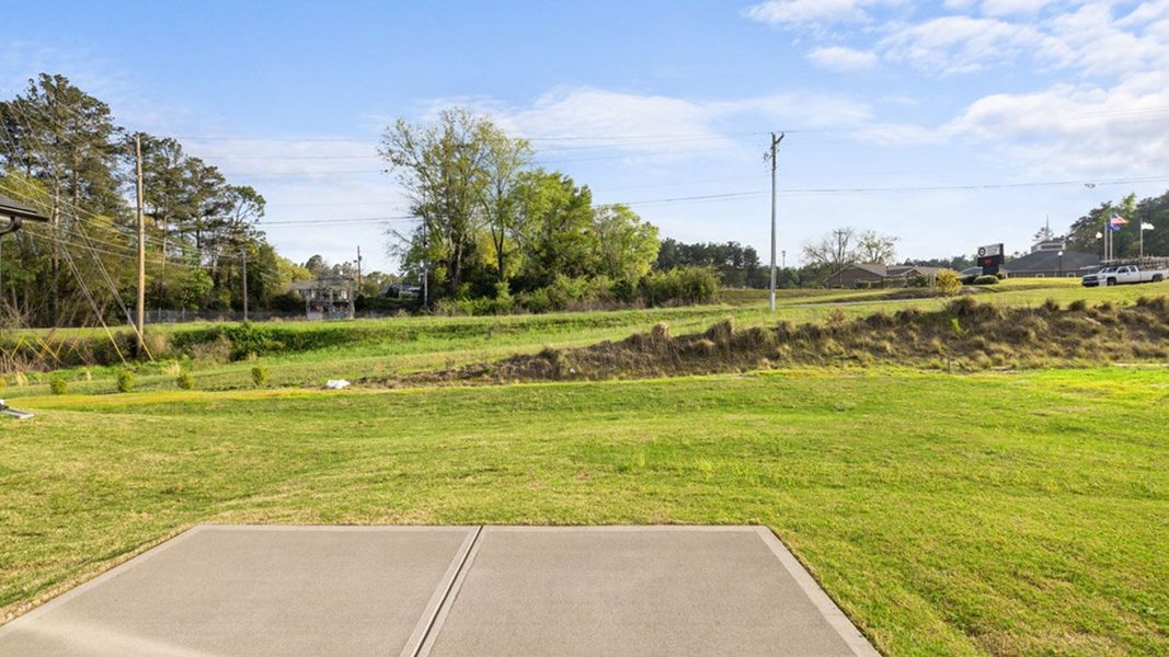 Exterior details and patio area of a home in The Islands, Beech Island (Image 3).