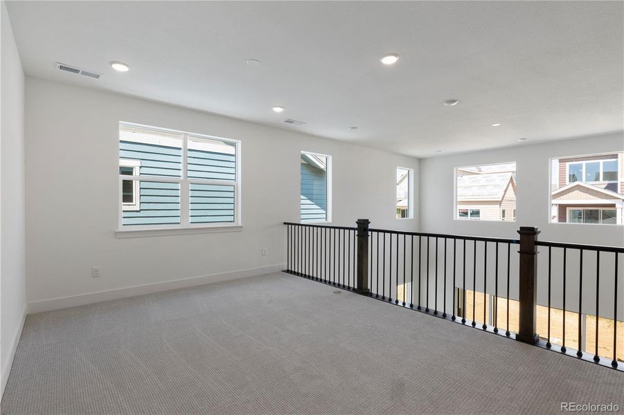 Spacious, unfurnished interior of a new home in Dillon Pointe - Journey, Broomfield (Image 21).