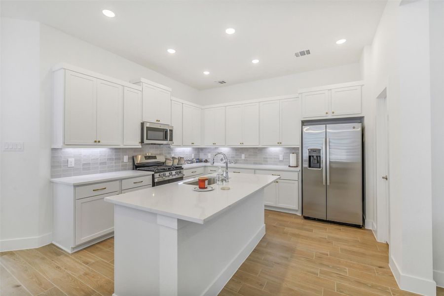 Furnished interior view inside a new home in , Cypress (Image 11).