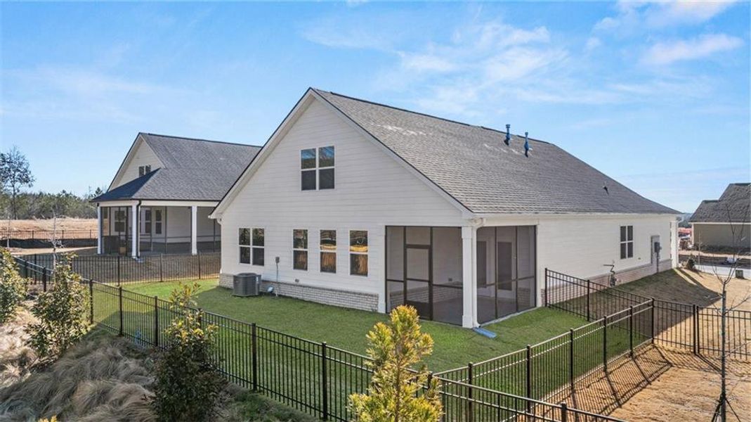 Exterior details and patio area of a home in Oak Ridge Meadows - Active Adult, Locust Grove (Image 3).