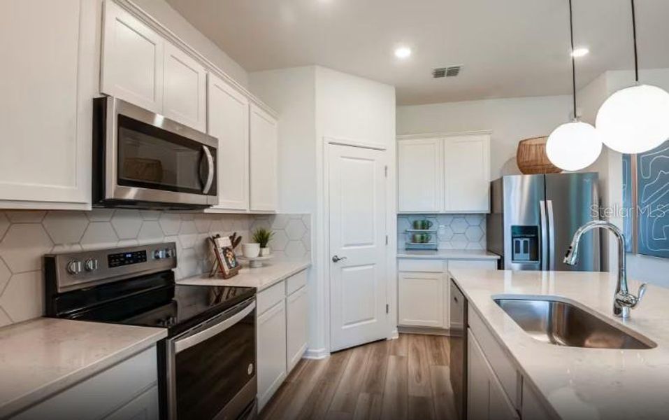 Furnished interior view inside a new home in , Bradenton (Image 8). Furnished interior view inside a new home in , Bradenton (Image 8).