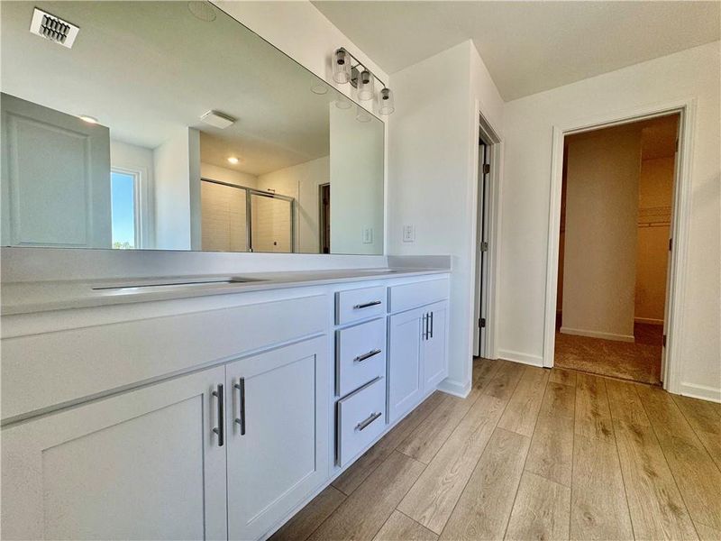 Furnished interior view inside a new home in Eastlyn Crossing, Flowery Branch (Image 8).