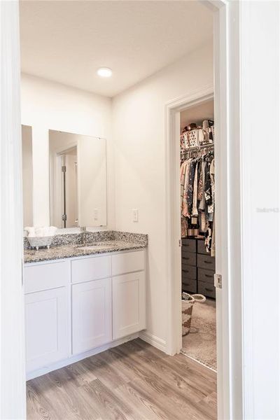 Furnished interior view inside a new home in Eagle Hammock, Eagle Lake (Image 15).