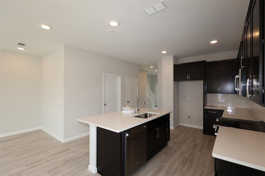 Furnished interior view inside a new home in Center Lake on the Park, St. Cloud (Image 10).